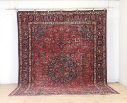 A Persian Sarouk wool carpet