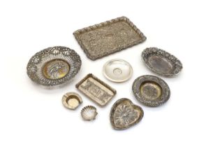 A collection of silver dishes,