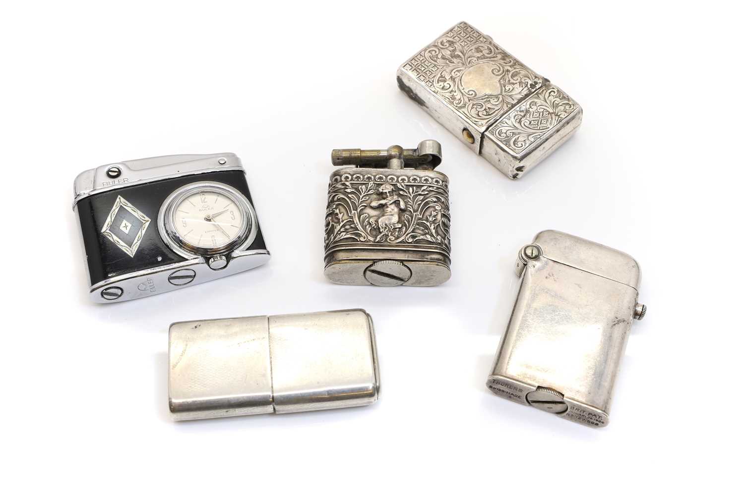 A group of silver lighters