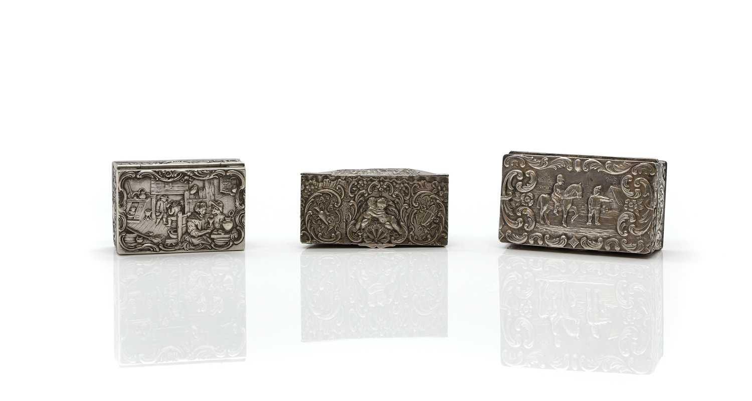 A group of three silver boxes