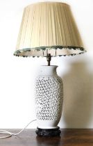 A Chinese blanc de chine ceramic table lamp,