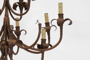 A wrought-metal sixteen-light chandelier,