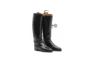 A pair of black leather ladies' hunting boots,