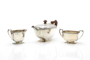 A three piece silver tea service