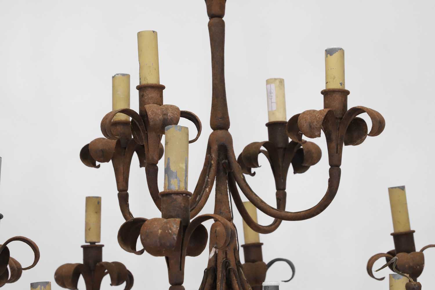 A wrought-metal sixteen-light chandelier, - Image 4 of 6