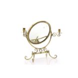 A small brass dressing table mirror,