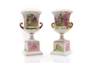 A pair of Dresden-style twin handled porcelain urns