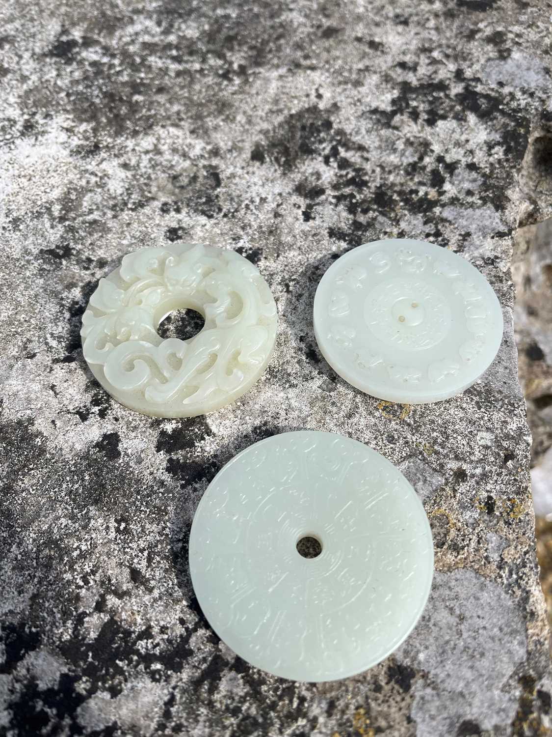 A group of three Chinese jade bi disc, - Image 24 of 29