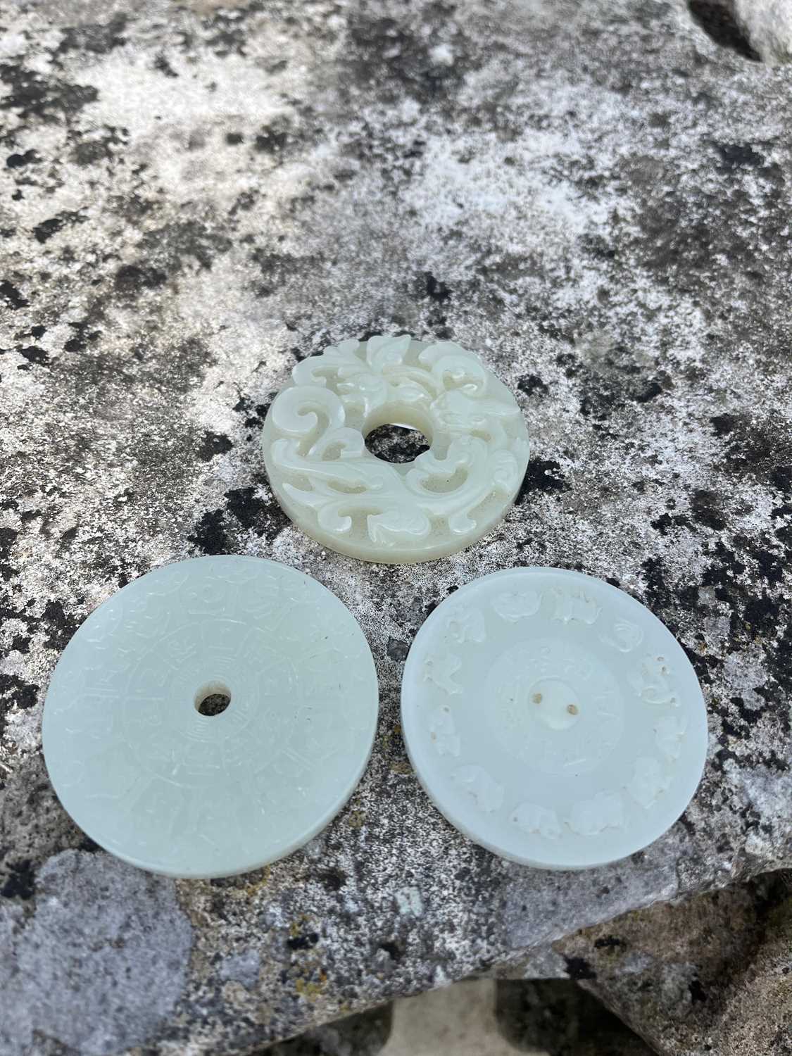 A group of three Chinese jade bi disc, - Image 25 of 29