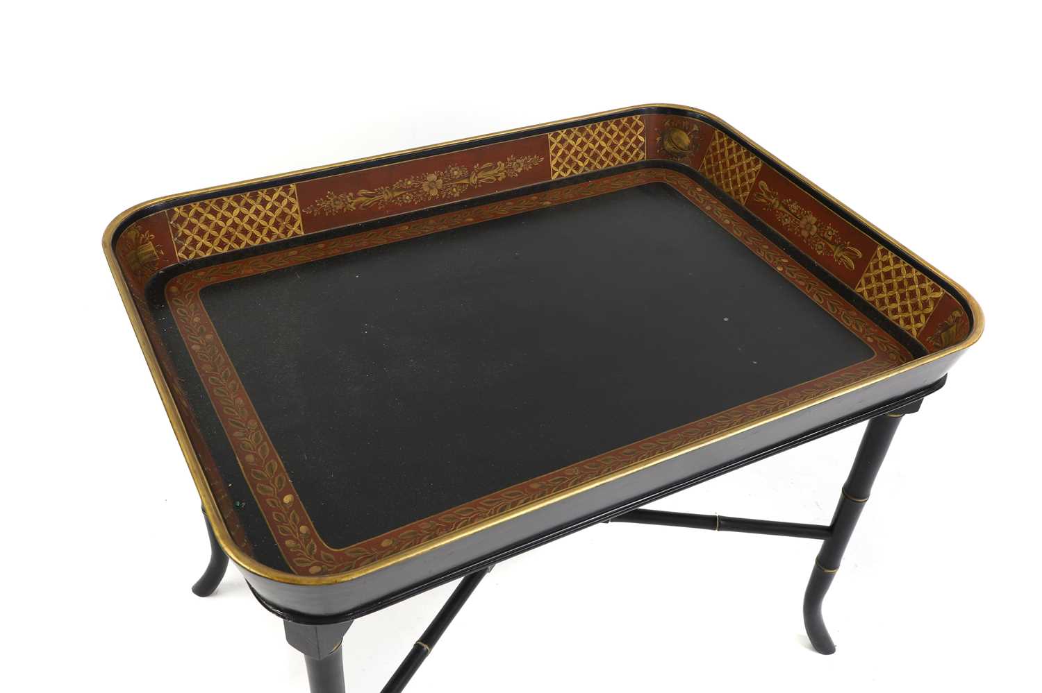 A Regency-style ebonised and parcel-gilt tray table, - Image 3 of 3