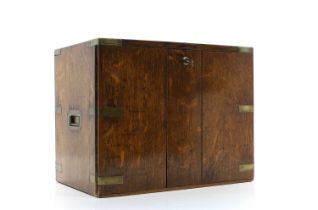 An oak and brass bound three-drawer cabinet,