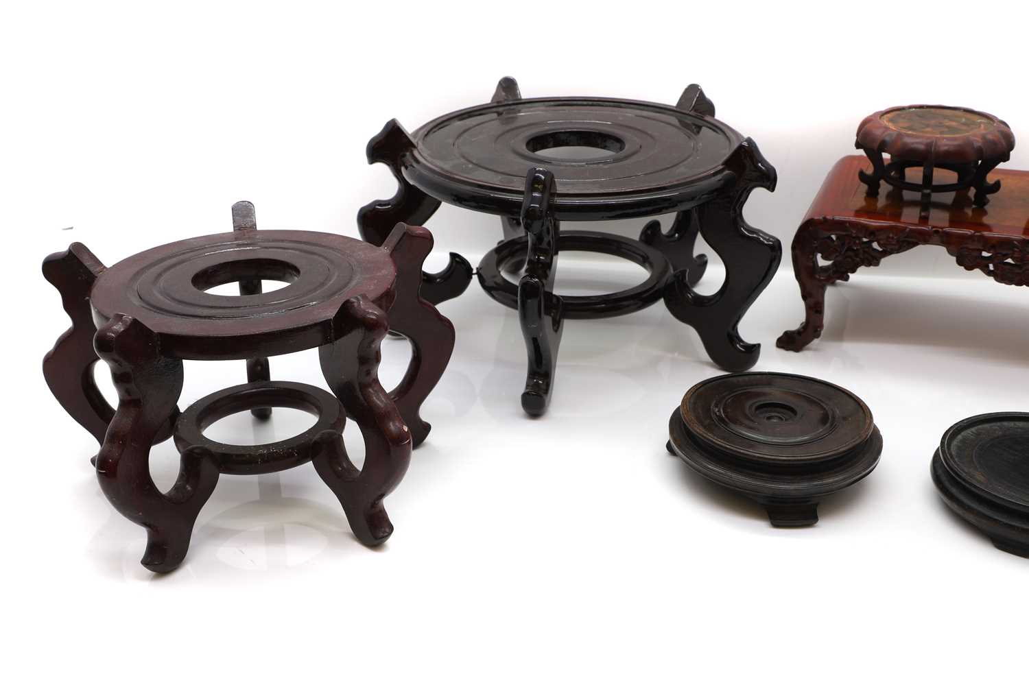 A collection of eight Chinese wood stands, - Image 2 of 3