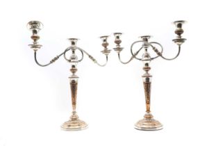 A pair of Victorian silver-plated candelabras,