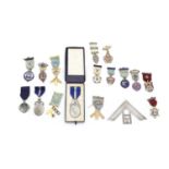 A collection of silver and 9ct gold Masonic medals