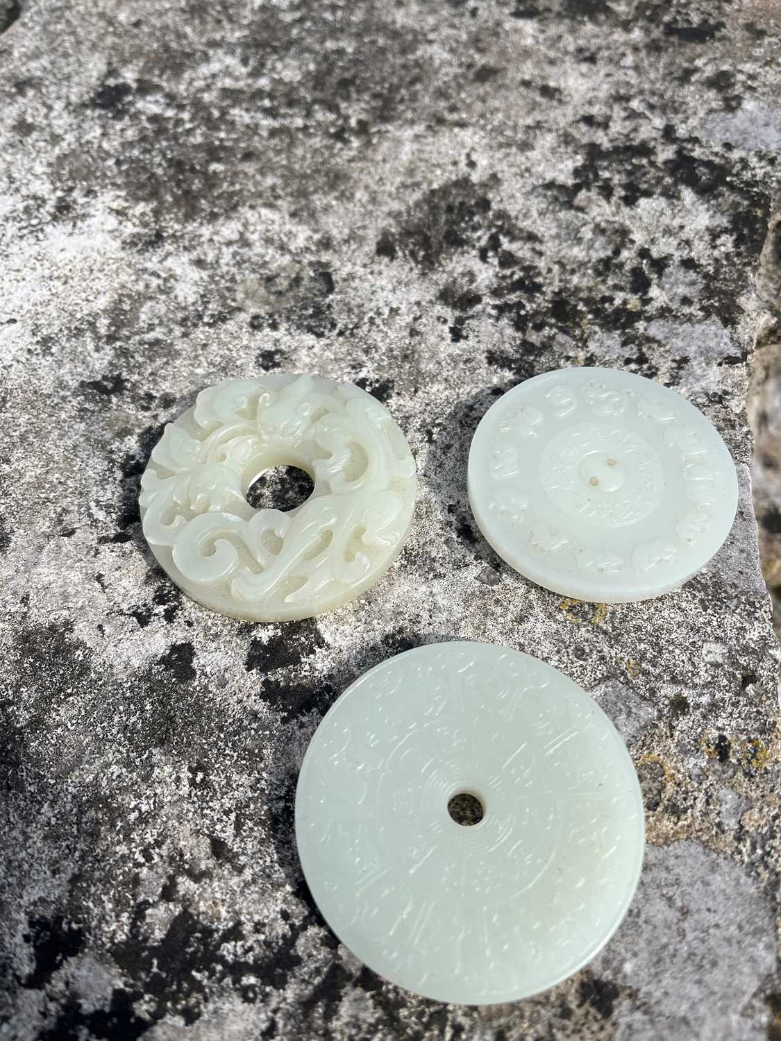 A group of three Chinese jade bi disc, - Image 23 of 29