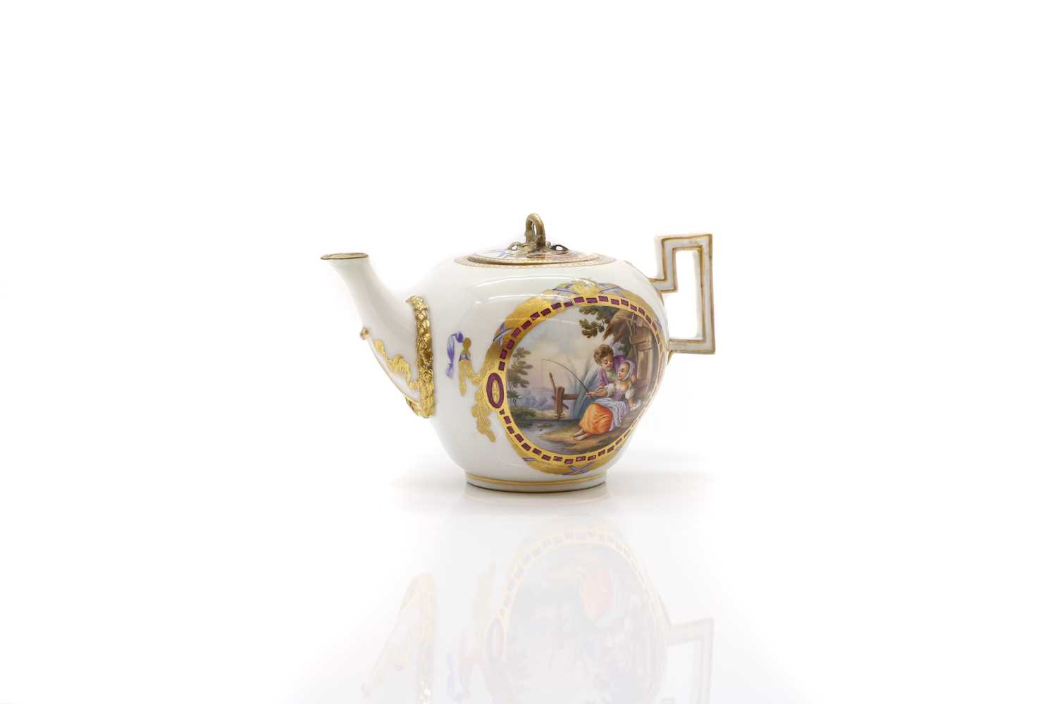 A Meissen style porcelain teapot and cover,