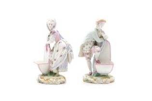A pair of Continental porcelain figures,