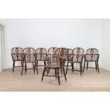 A set of eight yew and elm Windsor chairs,