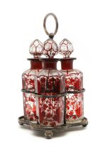 A set of three bohemian flashed glass decanters,