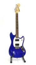 A Squire Fender Mustang electric guitar,