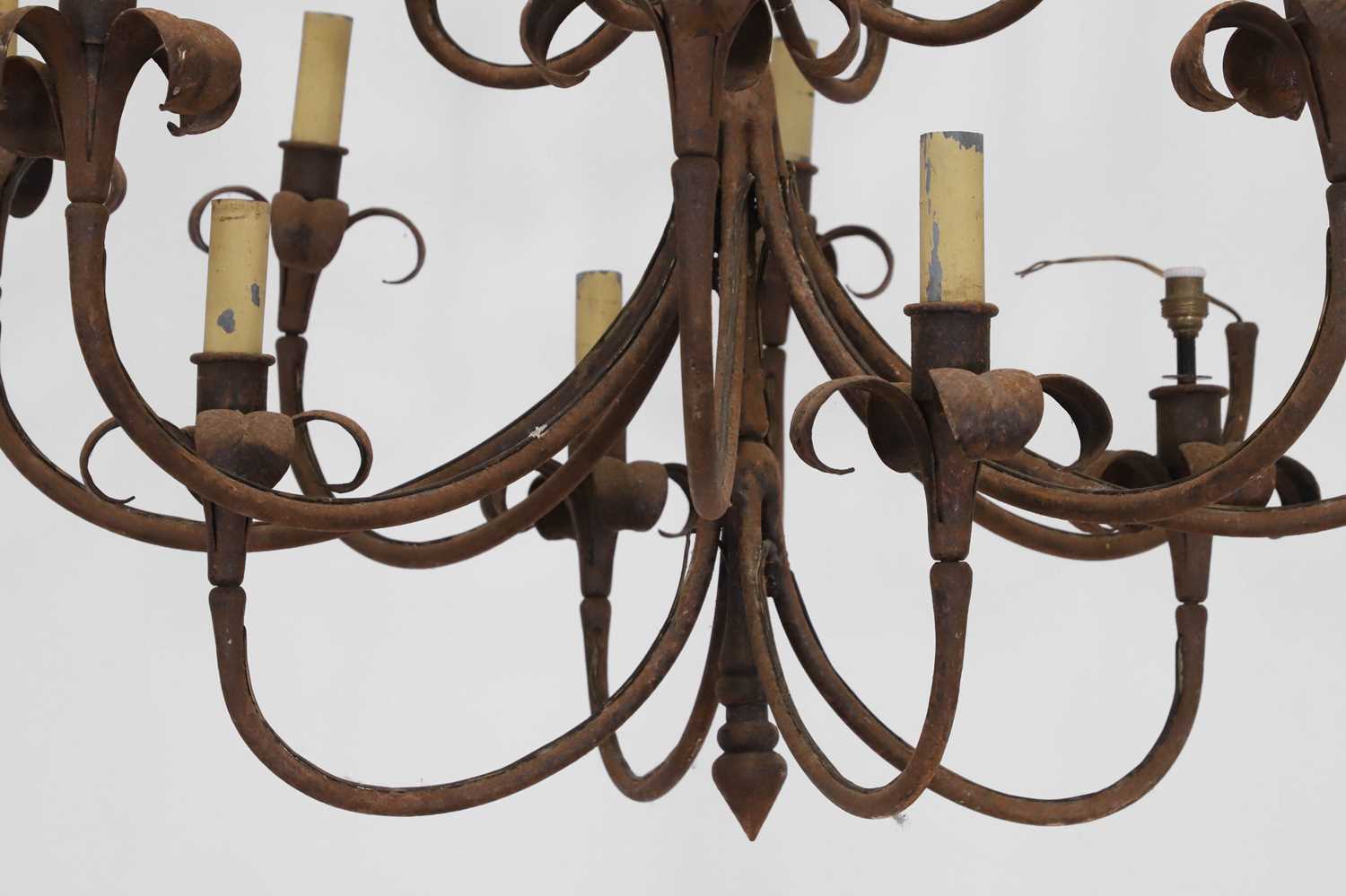 A wrought-metal sixteen-light chandelier, - Image 2 of 6