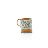 A Moorcroft stoneware mug,