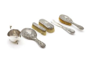 A silver mounted dressing table set