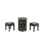 A pair of Chinese hardwood and marble inset jardiniere stands,