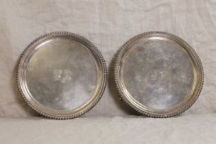 A pair of George III silver salvers,