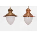 A pair of copper ceiling lights,