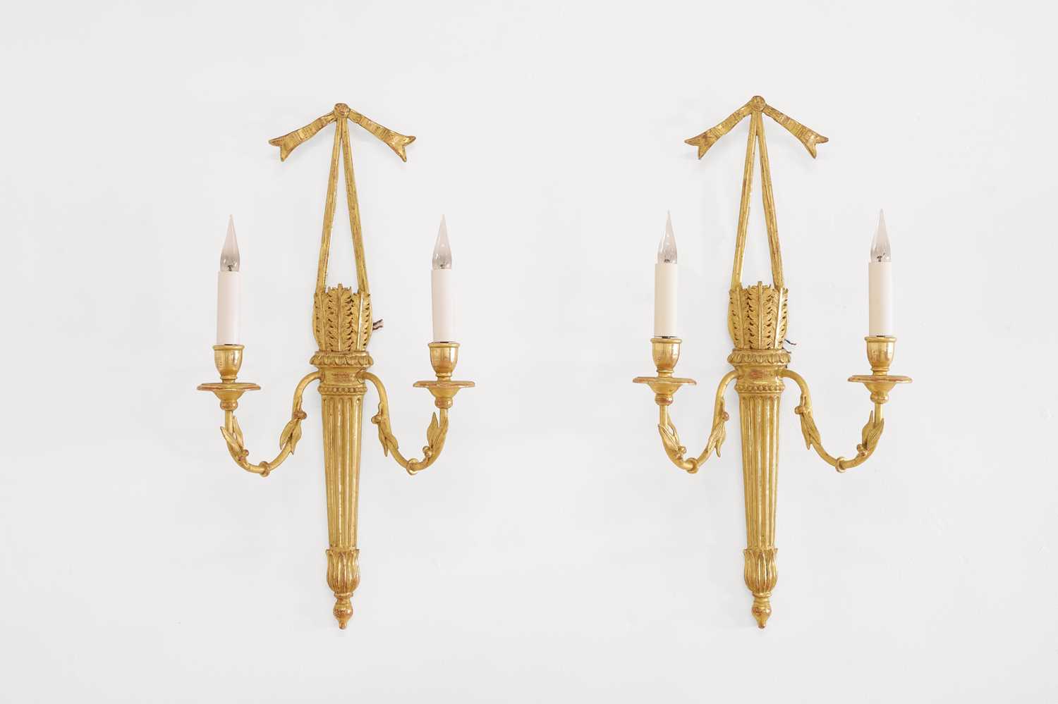 A pair of Louis XVI-style giltwood and composition wall lights by Leone Cei & Figli of Florence,