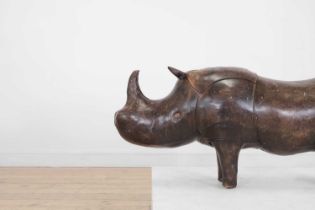 A leather rhino footstool,