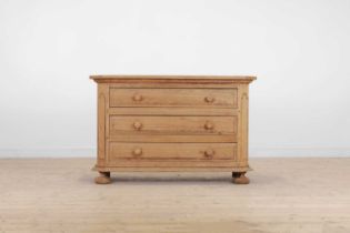 A baroque-style stripped oak commode,