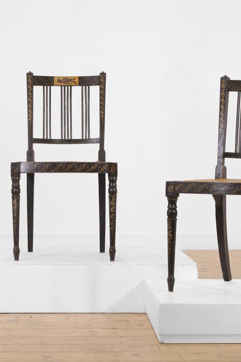 A pair of George III ebonised and painted wooden side chairs, - Image 3 of 6