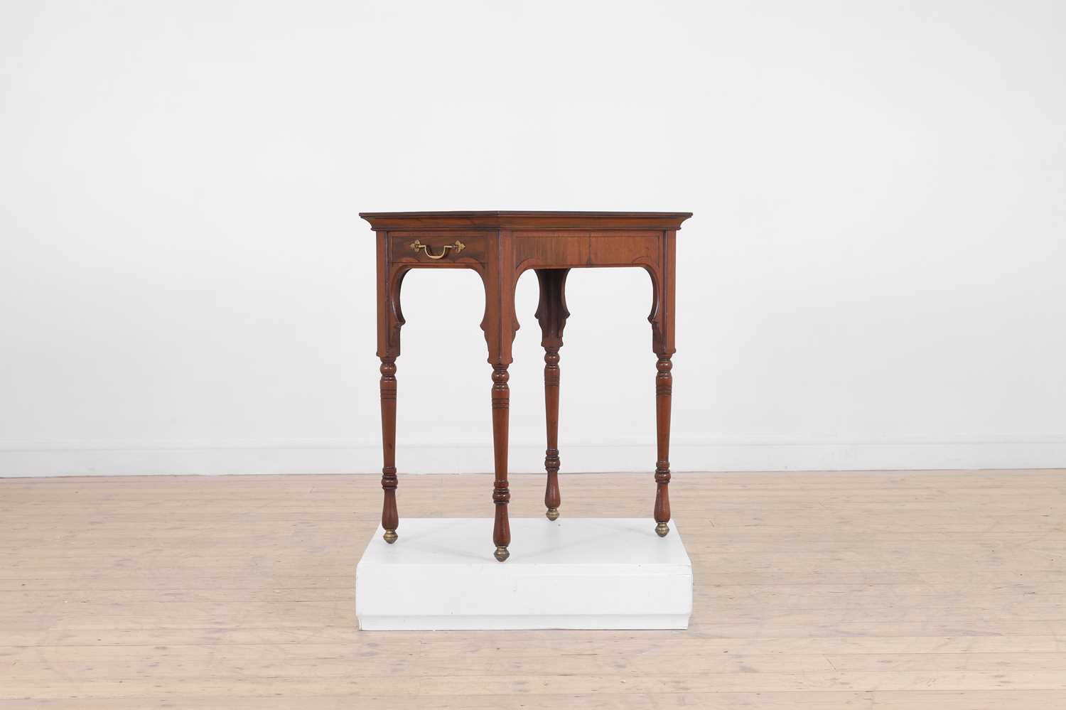 A Victorian Aesthetic Period walnut occasional table,