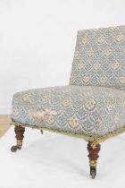 A late Victorian nursing chair by Howard & Sons,