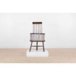 A small ash and elm comb-back Windsor chair,