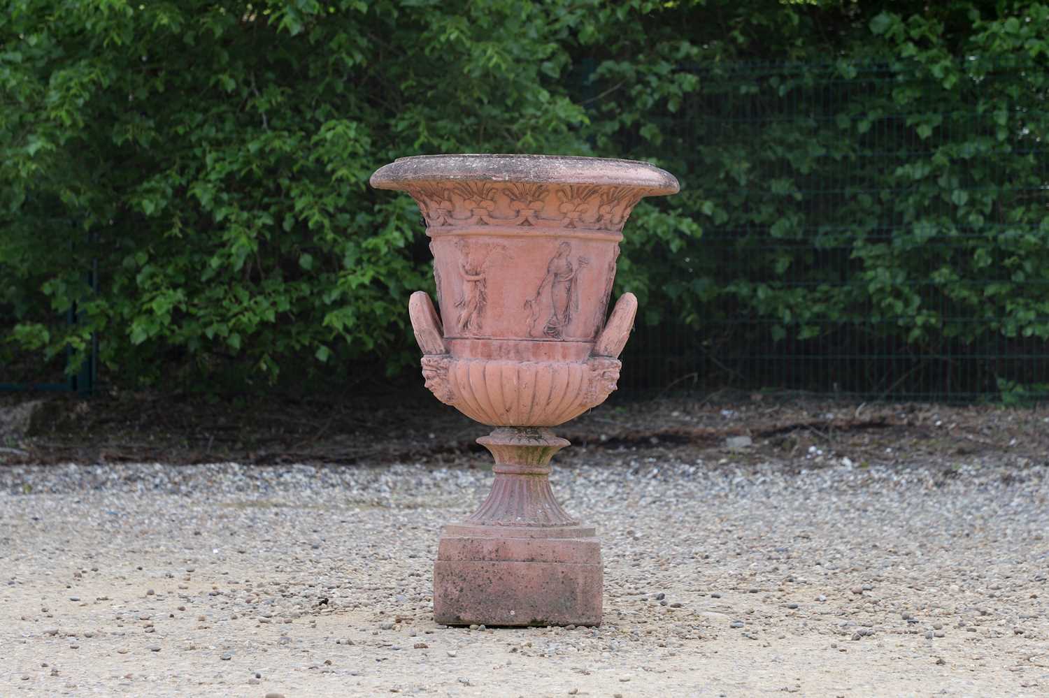 A terracotta garden urn,