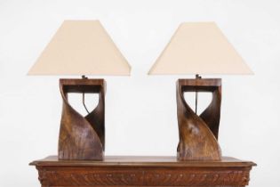 A pair of wooden table lamps,