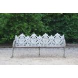 A painted cast iron garden seat,