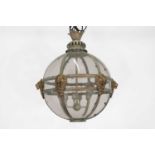 A large Regency-style patinated and gilt-brass globe lantern,