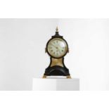 A George III ebonised and brass-mounted balloon clock,