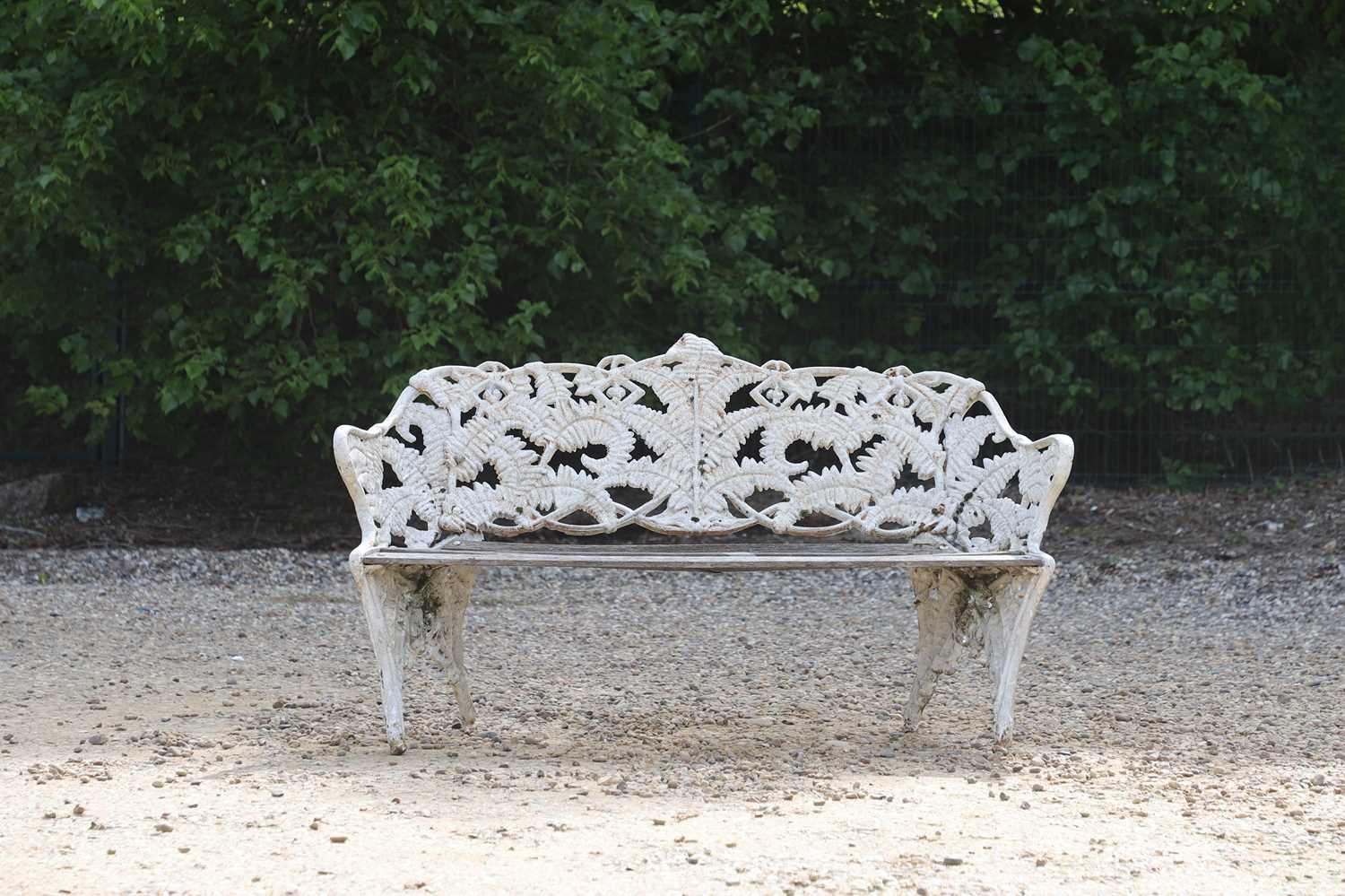 A Coalbrookdale-style painted cast iron garden bench,