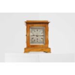 A satinwood library clock,
