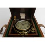 A mahogany and brass-mounted marine chronometer,