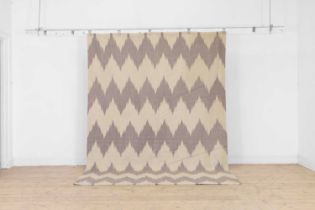 A modernist flat-weave wool carpet,