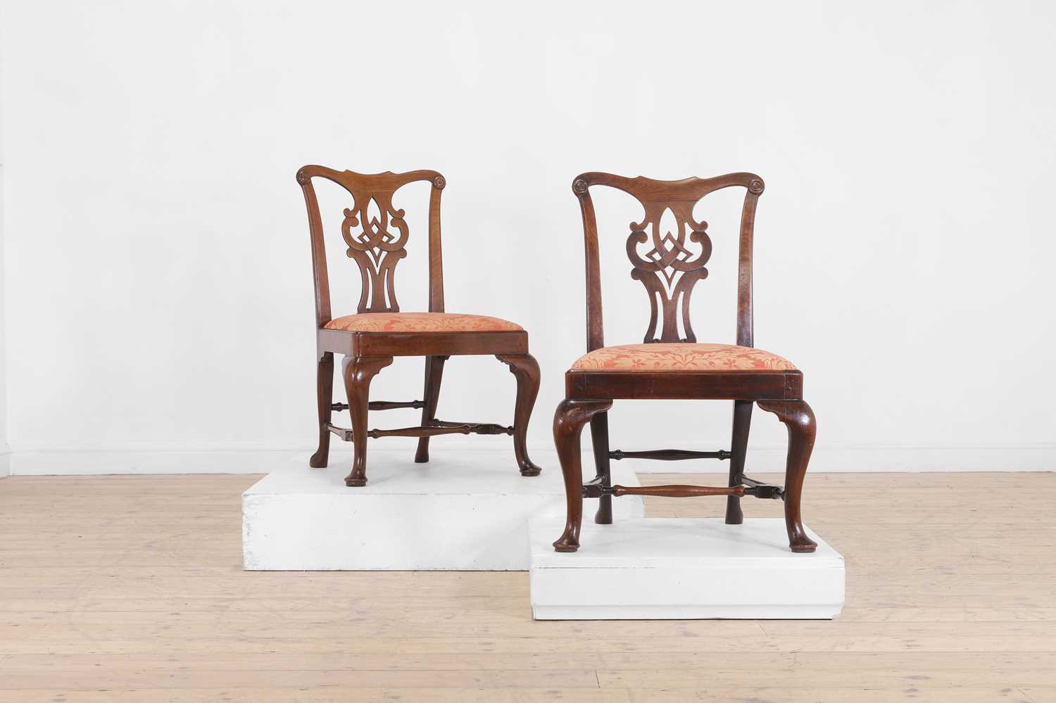 A pair of George II mahogany side chairs,