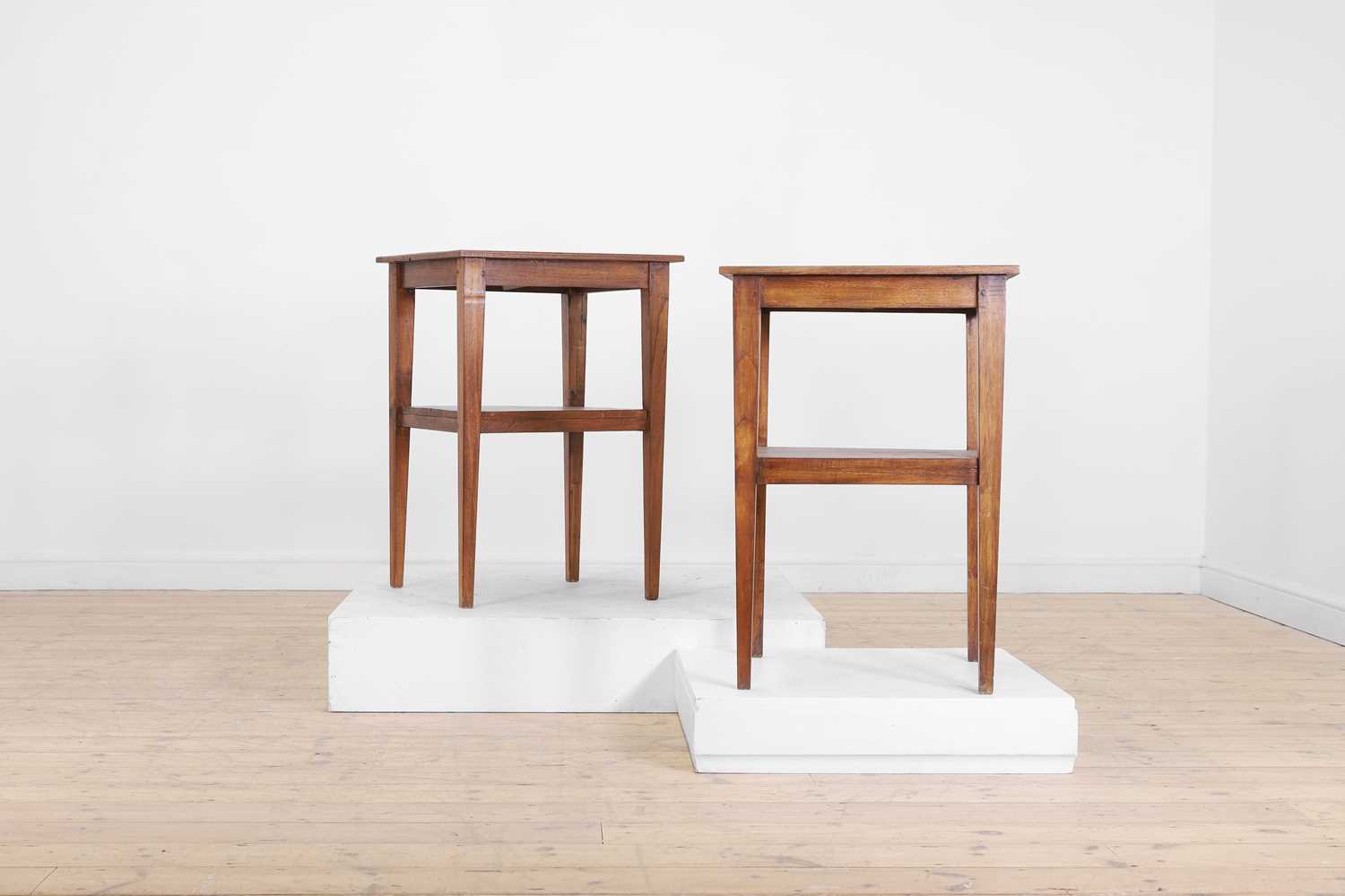 A pair of chestnut side tables,