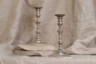 A pair of George III silver tapersticks,