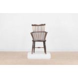 An ash and elm comb-back Windsor chair,